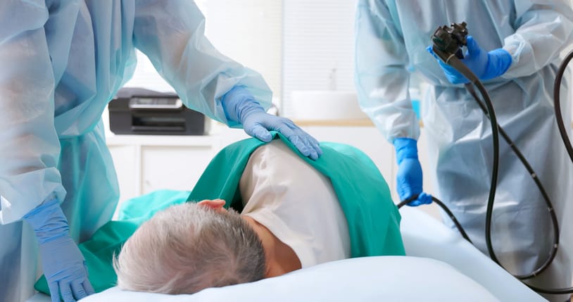 Photo shows man getting a colonoscopy