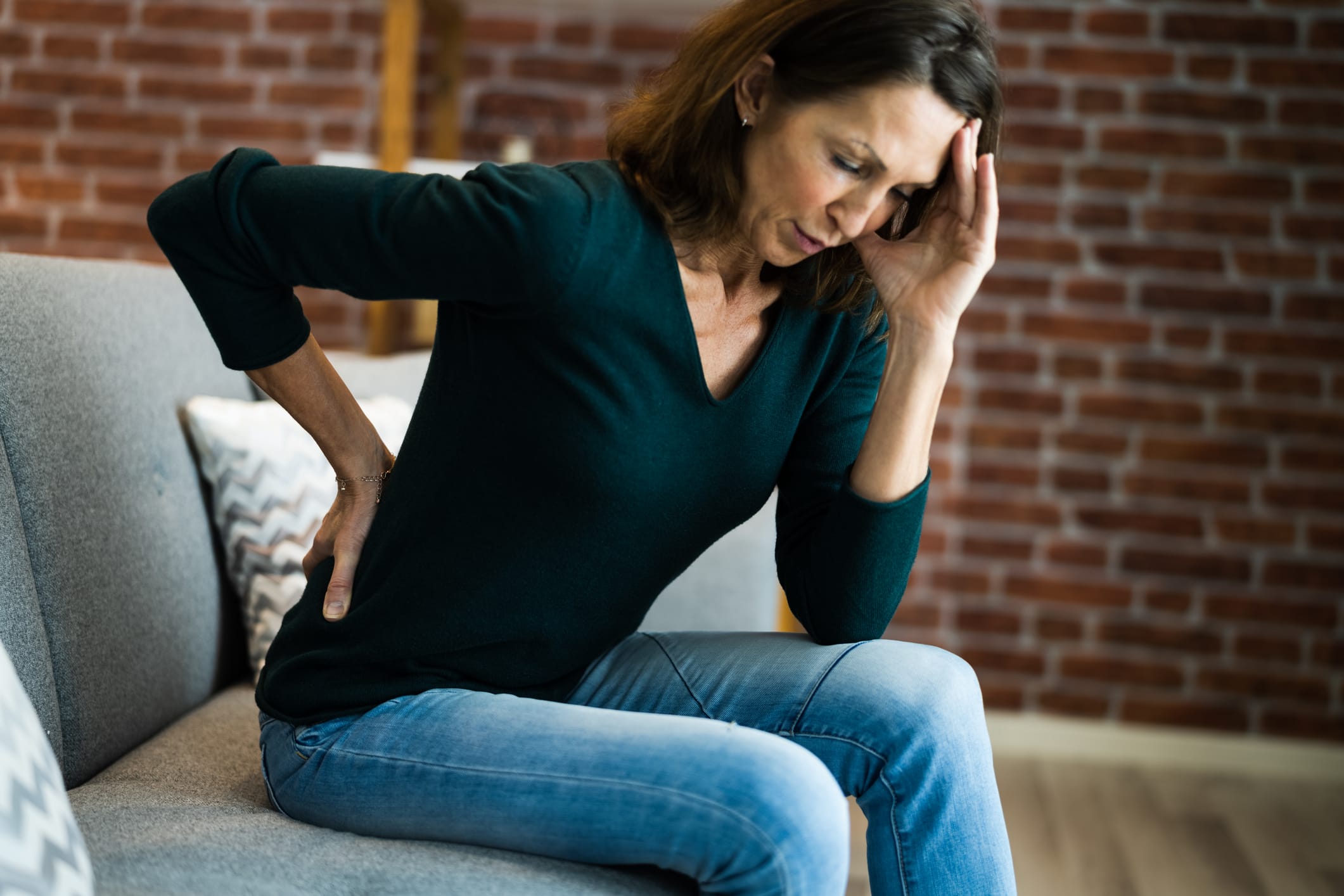 Woman With Back Pain And Ache