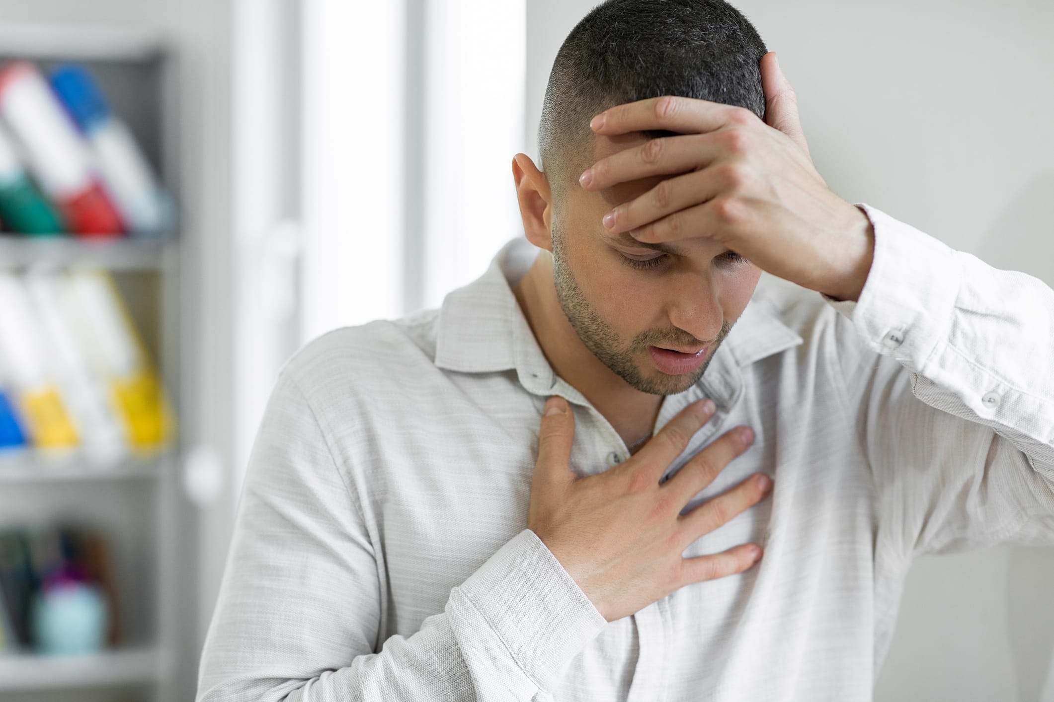 Man suffering from breathing problem