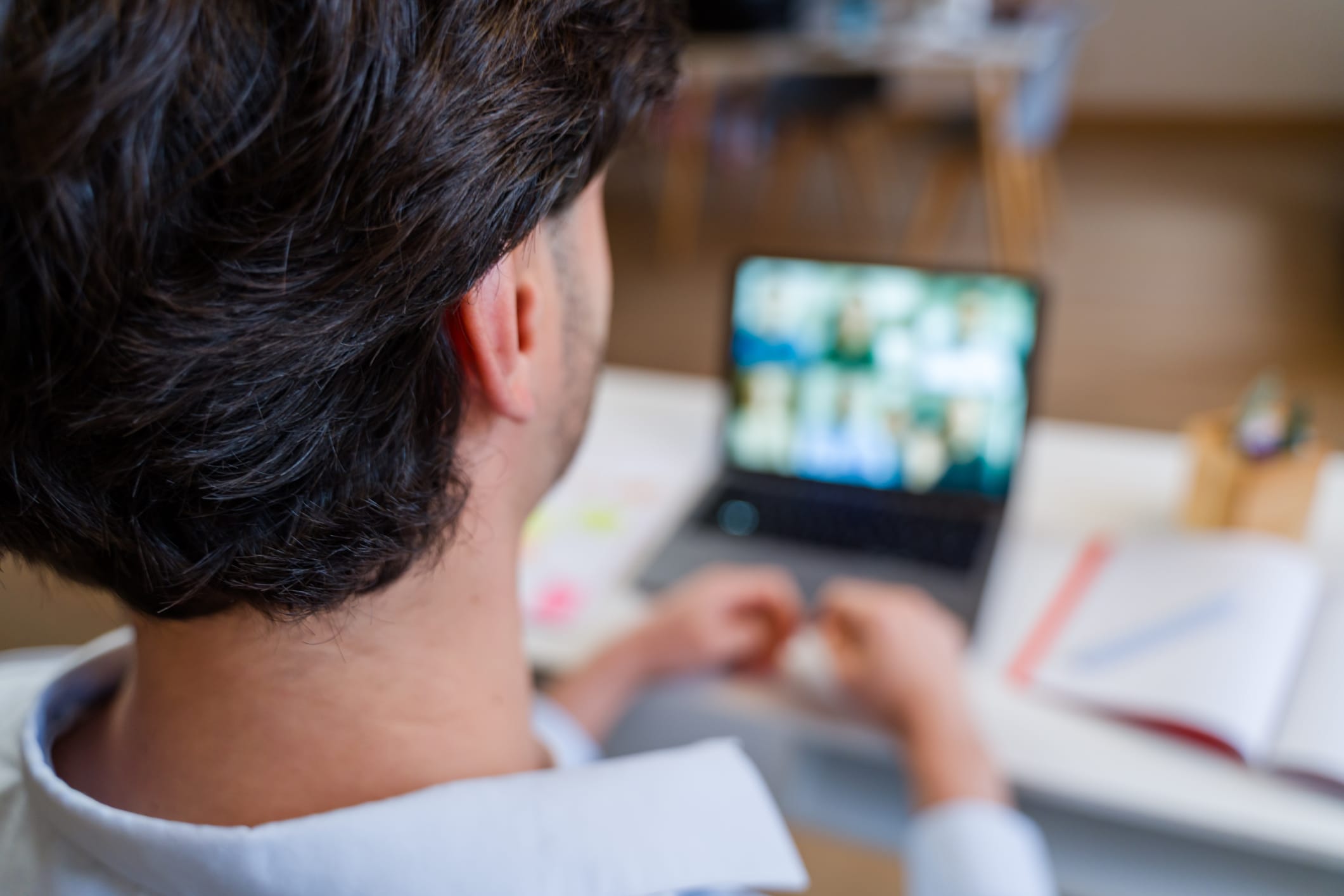 Man in virtual meeting