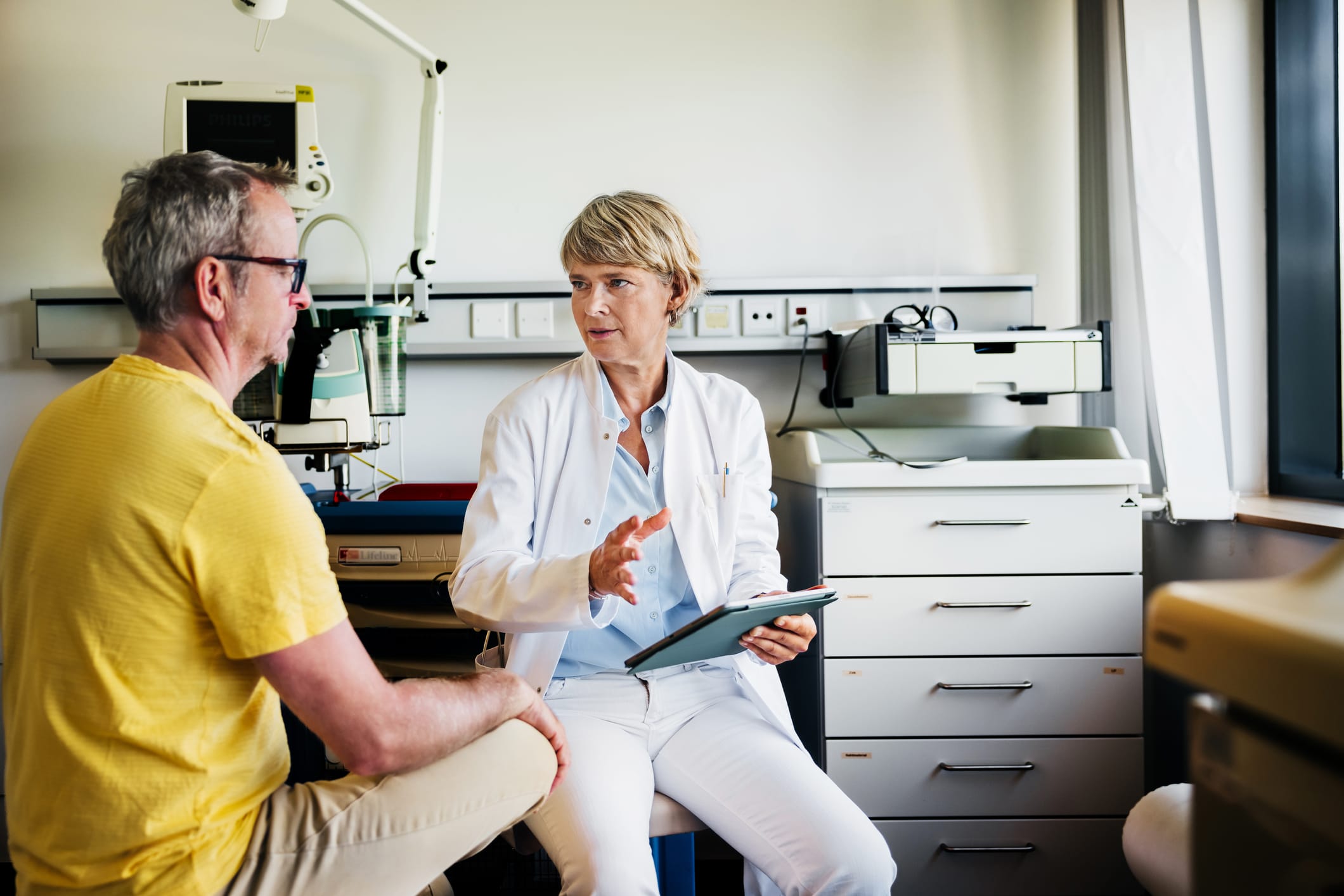 Man talking with his doctor in an office